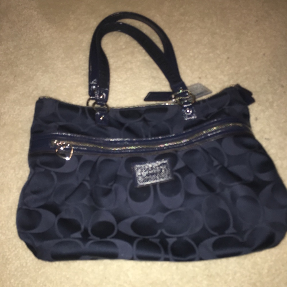 Women’s navy blue coach purse